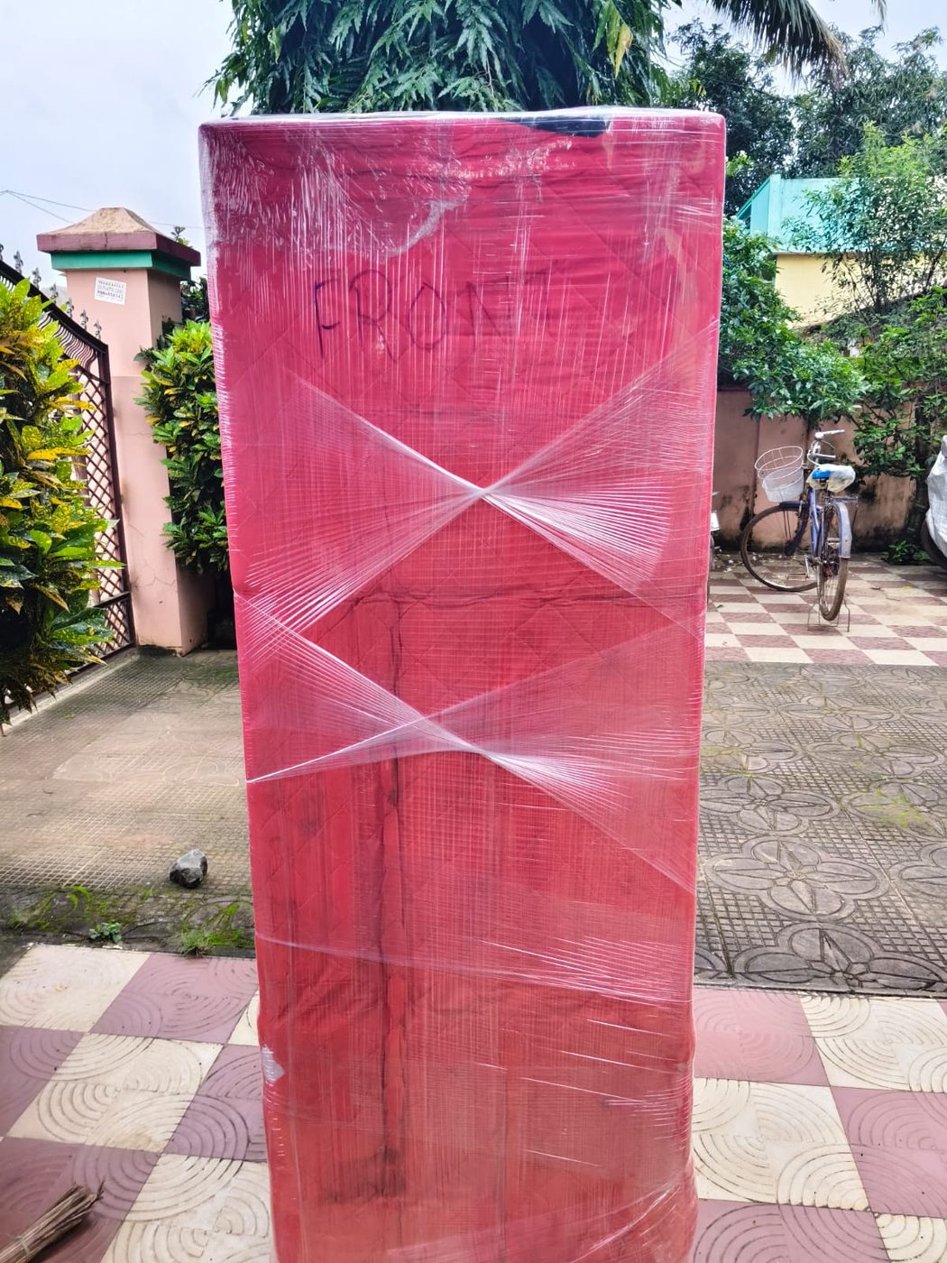 Mattress and furniture wrapped in protective film