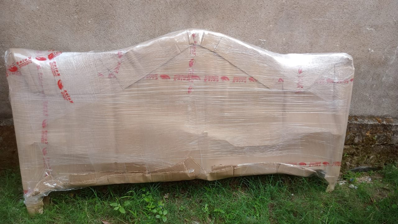 Two-wheeler packed and wrapped for transport